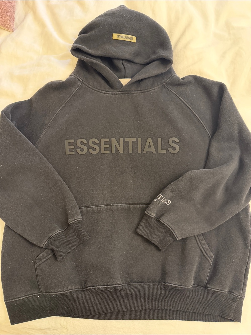 Essentials Black Pullover Hoodie with Raised Chest Logo